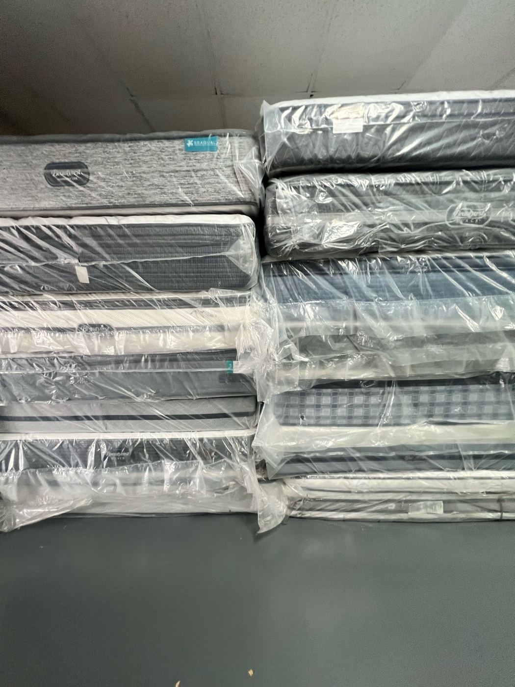 Brand-name mattresses in original wrapping